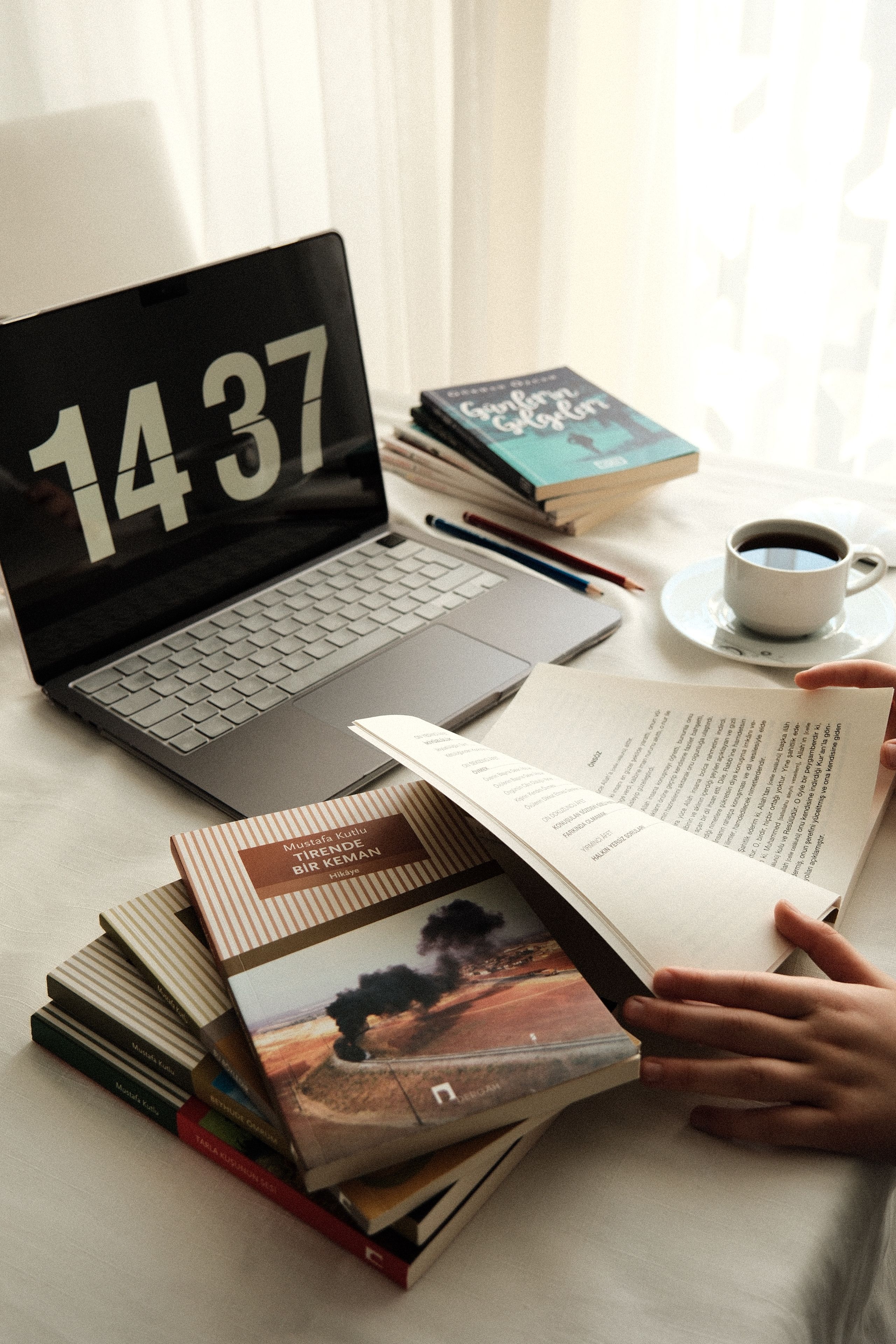 Writer drafting a manuscript with a professional ghostwriting team